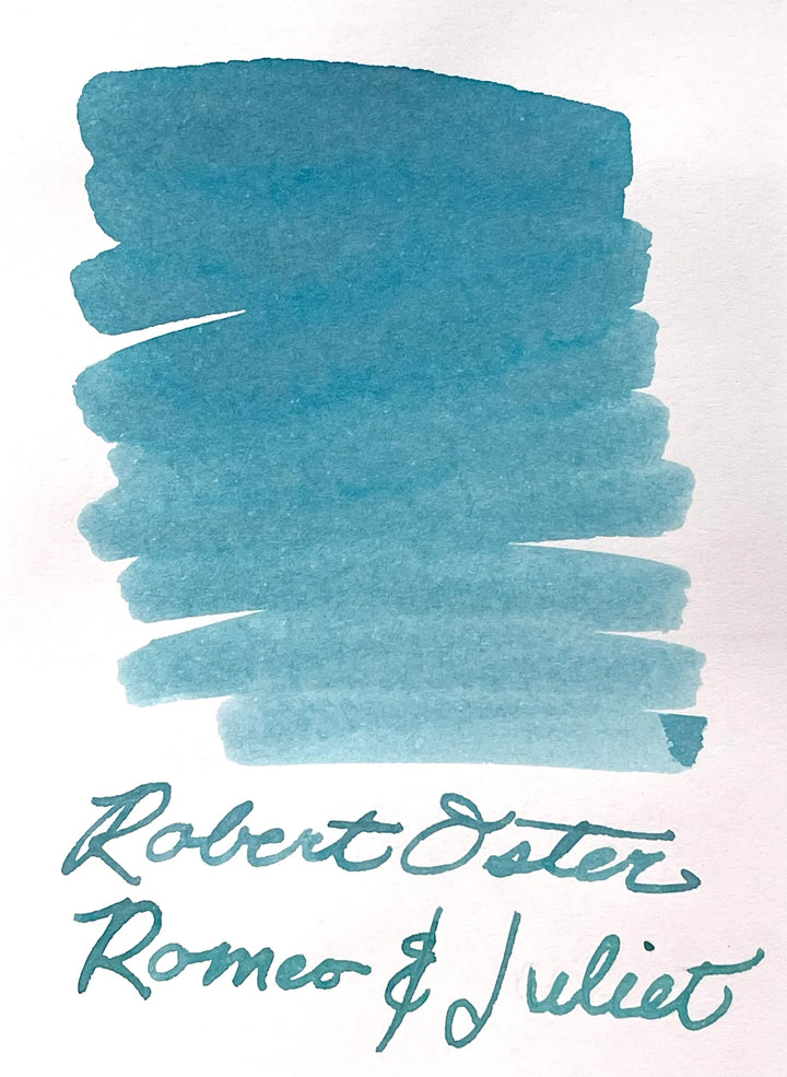 Robert Oster Romeo and Juliet is a dusky blue grey ink with high shading. It dries in 20 seconds in a medium nib on Rhodia and has a dry flow. Robert Oster ink is made in Australia. This is a limited edition color released during September and October 2023.